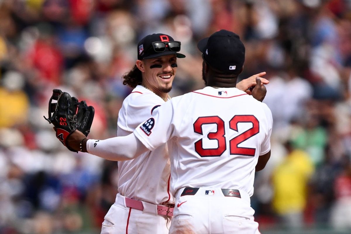 Jul 26, 2026; Boston, Massachusetts, USA; Boston Red Sox left fielder Jarren Duran (16) high-fives shortstop Andruw Monasterio (32) after a game against the Toronto Blue Jays  at Fenway Park. Mandatory Credit: Brian Fluharty-Imagn Images