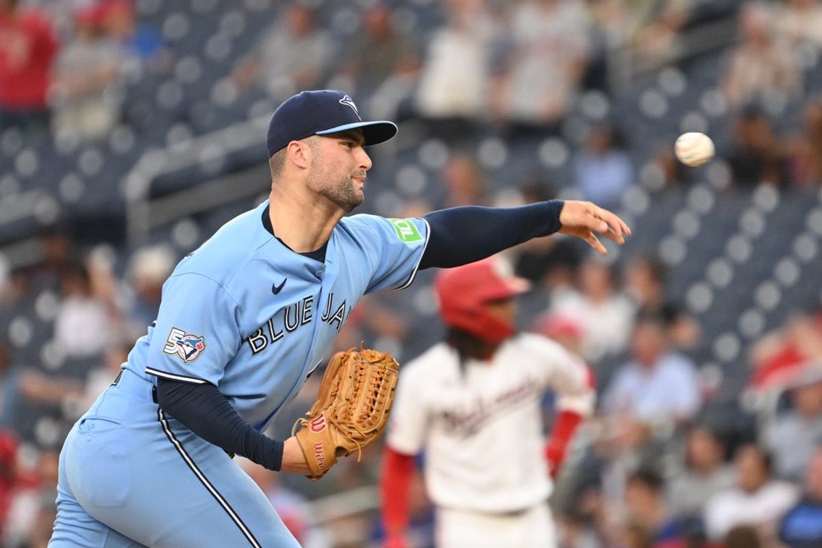 Jul 27, 2026; Washington, District of Columbia, USA; Toronto Blue Jays pitcher Mason Fluharty (68) throws a pitch against the Washington Nationals during the third inning at Nationals Park. Mandatory Credit: Rafael Suanes-Imagn Images