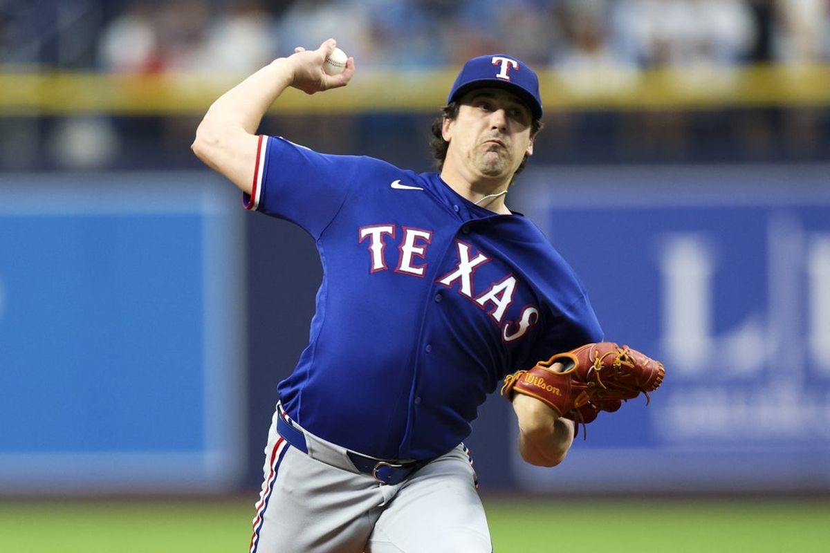 Jul 28, 2026; St. Petersburg, Florida, USA; Texas Rangers pitcher Cal Quantrill (44) throws a pitch against the Tampa Bay Rays in the first inning at Tropicana Field. Mandatory Credit: Nathan Ray Seebeck-Imagn Images