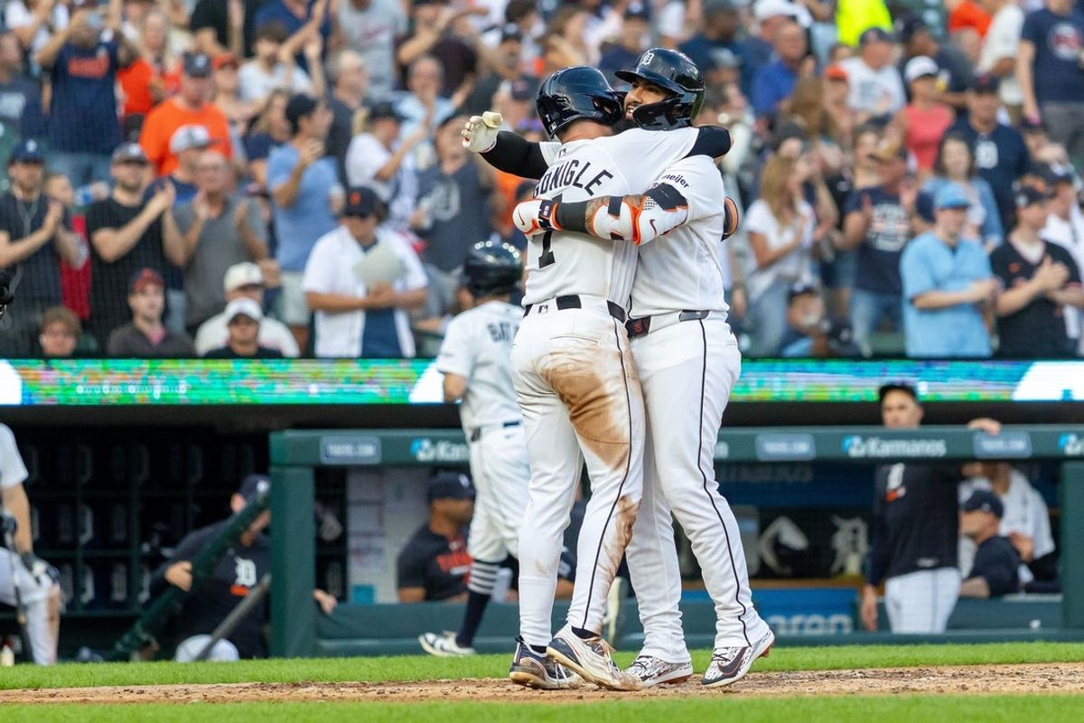 Jul 28, 2026; Detroit, Michigan, USA; Detroit Tigers second baseman Gleyber Torres (25) hits a two run home run off of Baltimore Orioles pitcher Dean Kremer (not pictured) in the fourth inning and celebrates with shortstop Kevin McGonigle (7) at Comerica Park. Mandatory Credit: David Reginek-Imagn Images