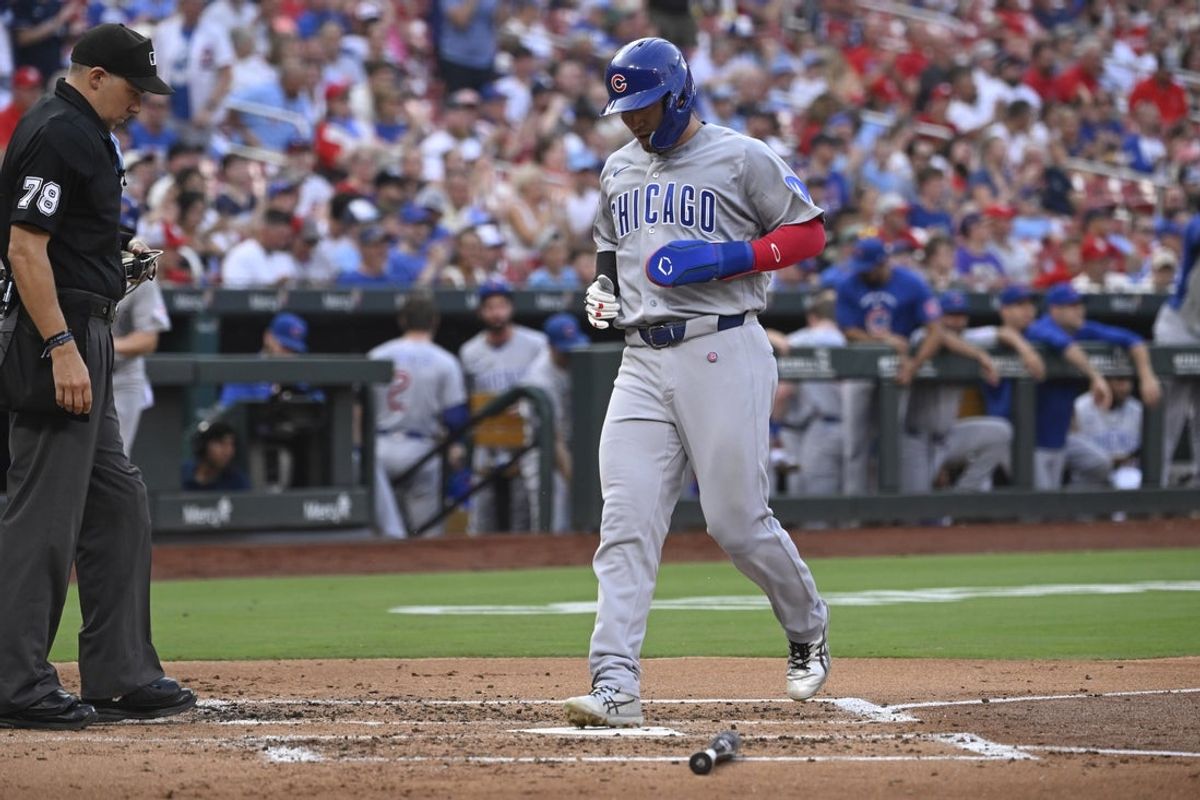 Jul 28, 2026; St. Louis, Missouri, USA; Chicago Cubs right fielder Seiya Suzuki (27) scores a run against the St. Louis Cardinals in the second inning at Busch Stadium. Mandatory Credit: Joe Puetz-Imagn Images