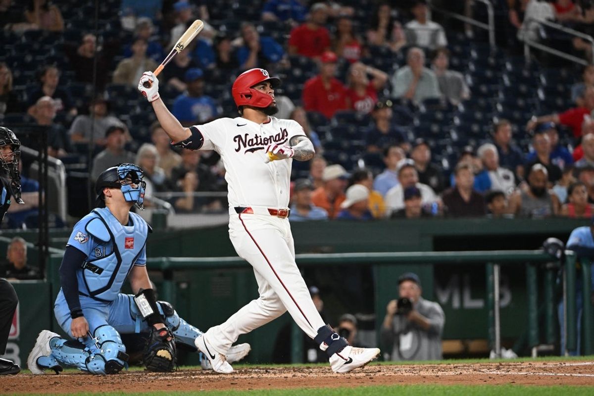 Jul 28, 2026; Washington, District of Columbia, USA; Washington Nationals first baseman Luis García Jr. (2) hits a two run home run against the Toronto Blue Jays during the fourth inning at Nationals Park. Mandatory Credit: Brad Mills-Imagn Images