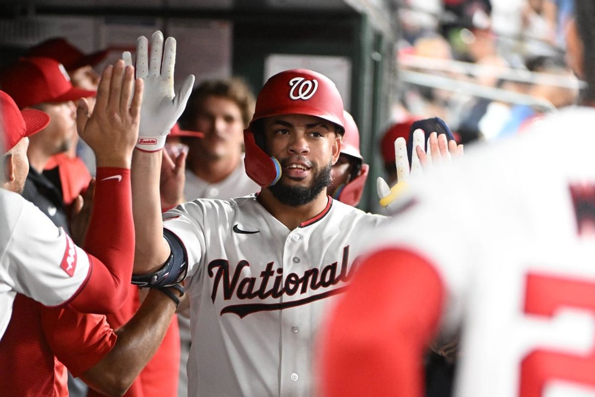 Jul 28, 2026; Washington, District of Columbia, USA; Washington Nationals first baseman Luis Garcia Jr. (2) is congratulated by teammates after hitting a two run home run against the Toronto Blue Jays during the fourth inning at Nationals Park. Mandatory Credit: Brad Mills-Imagn Images