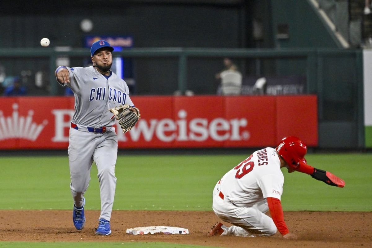 Jul 28, 2026; St. Louis, Missouri, USA; St. Louis Cardinals shortstop Bryan Torres (39) is out at second base as Chicago Cubs second baseman Pedro Ramirez (75) turns a double play in the eighth inning at Busch Stadium. Mandatory Credit: Joe Puetz-Imagn Images