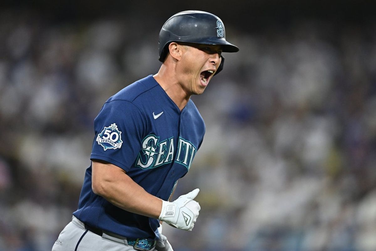 Jul 28, 2026; Los Angeles, California, USA; Seattle Mariners designated hitter Rob Refsnyder (30) reacts after hitting a two-run home run during the fourth inning against the Los Angeles Dodgers at Dodger Stadium. Mandatory Credit: William Liang-Imagn Images