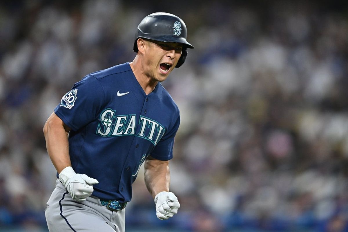 Jul 28, 2026; Los Angeles, California, USA; Seattle Mariners designated hitter Rob Refsnyder (30) reacts after hitting a two-run home run during the fourth inning against the Los Angeles Dodgers at Dodger Stadium. Mandatory Credit: William Liang-Imagn Images