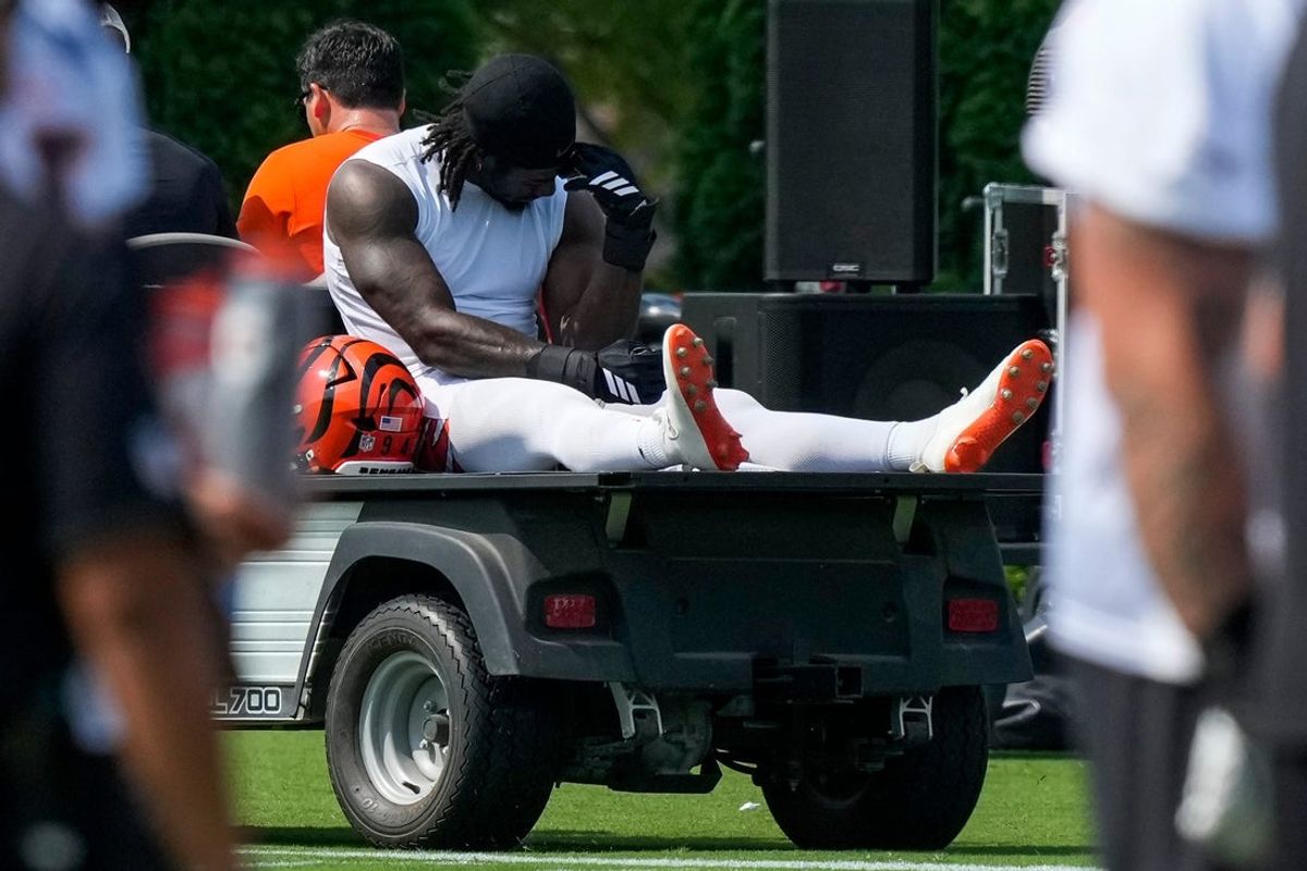 Cincinnati Bengals defensive end Shemar Stewart (94) is assisted off the field with an injury during the first day of Cincinnati Bengals training camp at the Paycor Stadium practice facility in downtown Cincinnati on Wednesday, July 29, 2026.