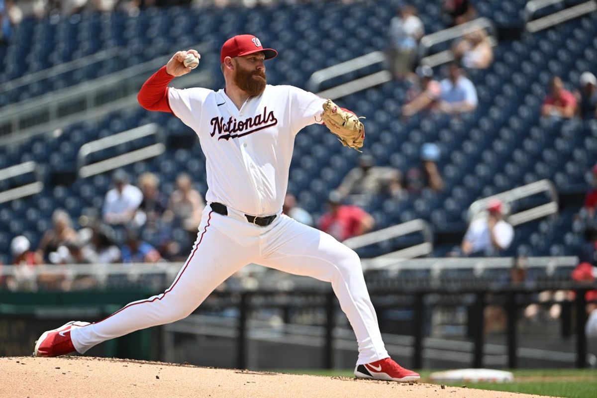 Jul 29, 2026; Washington, District of Columbia, USA; Washington Nationals pitcher Zack Littell (18) throws to the Toronto Blue Jays during the second inning at Nationals Park. Mandatory Credit: Brad Mills-Imagn Images