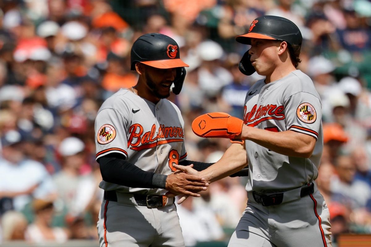 Jul 29, 2026; Detroit, Michigan, USA; Baltimore Orioles second baseman Jeremiah Jackson (82) and Baltimore Orioles second baseman Jackson Holliday (7) congratulates each other after scoring in the seventh inning against the Detroit Tigers at Comerica Park. Mandatory Credit: Rick Osentoski-Imagn Images