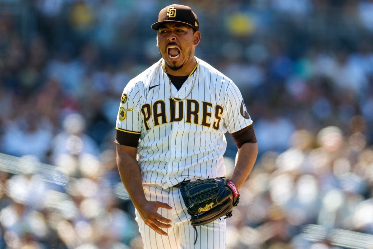 Jul 29, 2026; San Diego, California, USA; San Diego Padres relief pitcher Jeremiah Estrada (56) celebrates walking off the field during the eighth inning against the Colorado Rockies at Petco Park. Mandatory Credit: David Frerker-Imagn Images