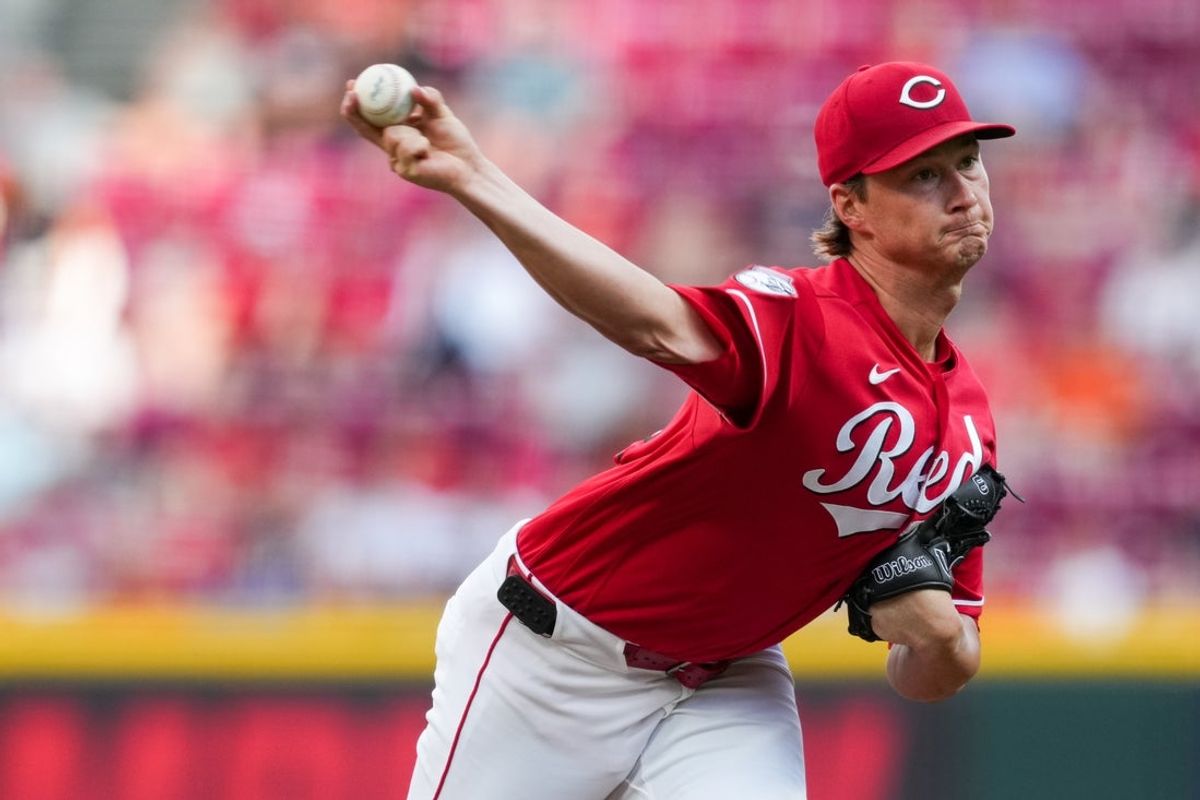 Jul 29, 2026; Cincinnati, Ohio, USA;  Cincinnati Reds pitcher Brady Singer throws against the Cleveland Guardians in the first inning at Great American Ball Park. Mandatory Credit: Aaron Doster-Imagn Images