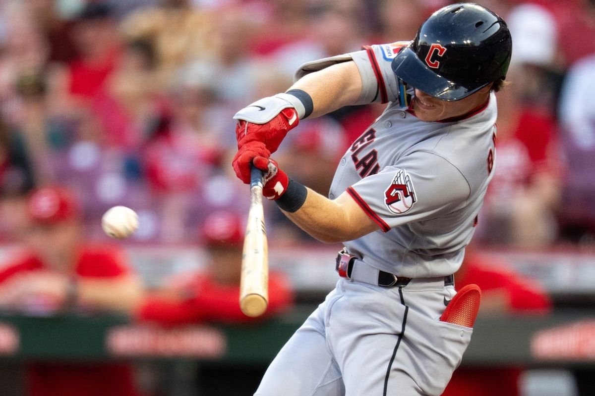 Cleveland Guardians third baseman José Ramírez (11) hits a base hit in the third inning between the Cleveland Guardians and Cincinnati Reds at Great American Ball Park in Cincinnati on Wednesday, July 29, 2026.