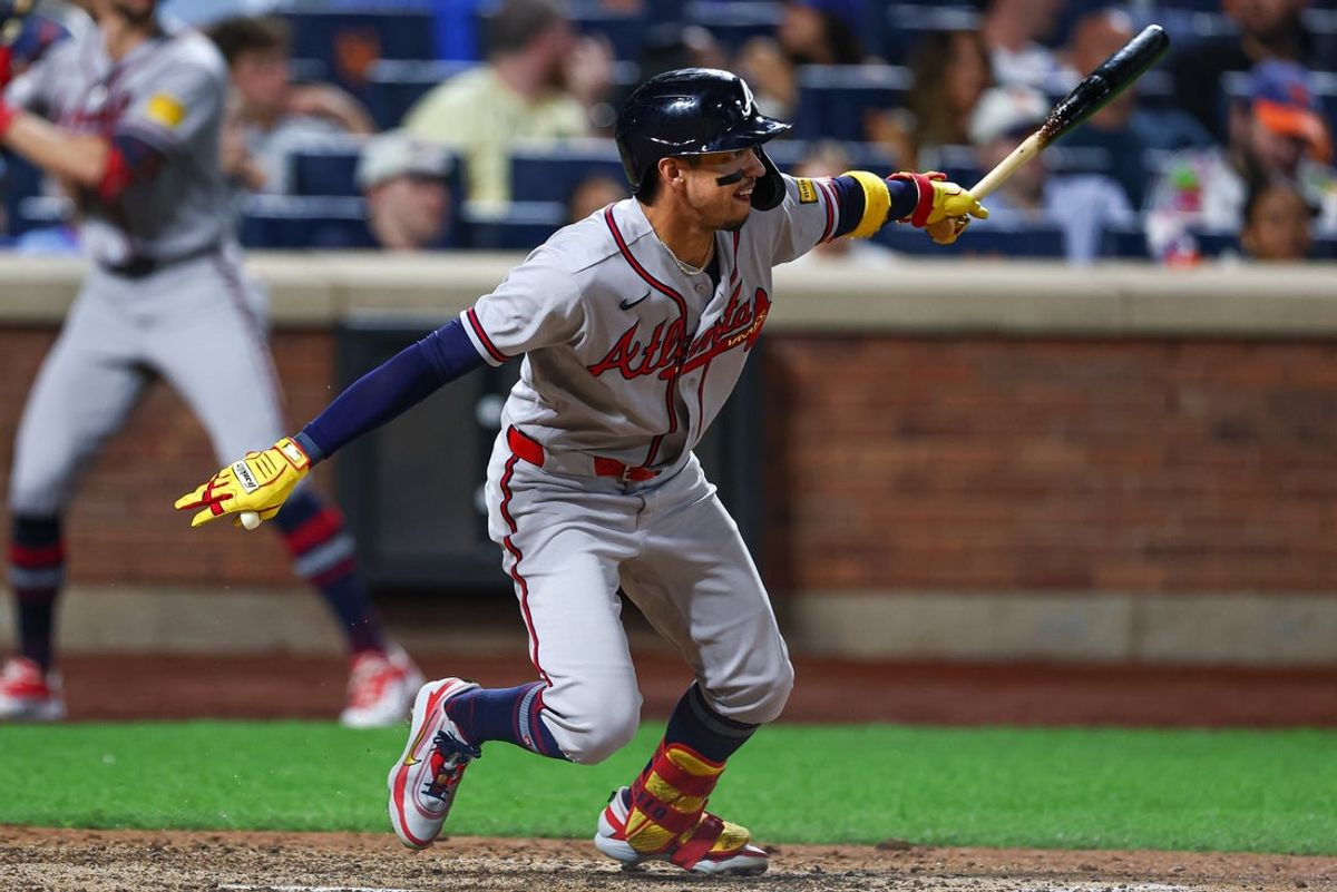 Jul 29, 2026; New York City, New York, USA;  Atlanta Braves left fielder Mauricio Dubon (14) singles during the ninth inning against the New York Mets at Citi Field. Mandatory Credit: Vincent Carchietta-Imagn Images