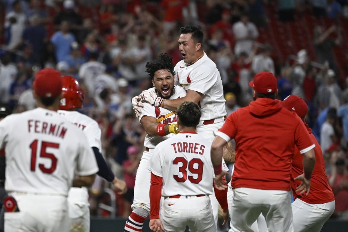 Jul 29, 2026; St. Louis, Missouri, USA; St. Louis Cardinals designated hitter Ivan Herrera (48) is congratulated after hitting a walk-off two-run double against the Chicago Cubs in the tenth inning at Busch Stadium. Mandatory Credit: Joe Puetz-Imagn Images