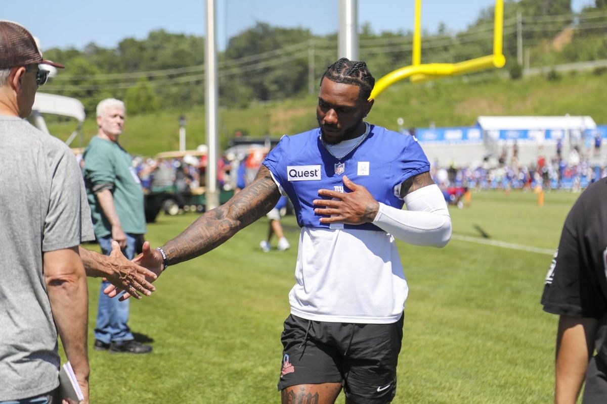 Jul 30, 2026; White Sulphur Springs, WV, USA; New York Giants wide receiver Malik Nabers (1) walks into a media interview after practice during training camp at The Greenbrier Resort Sports Performance Center. Mandatory Credit: Ben Queen-Imagn Images