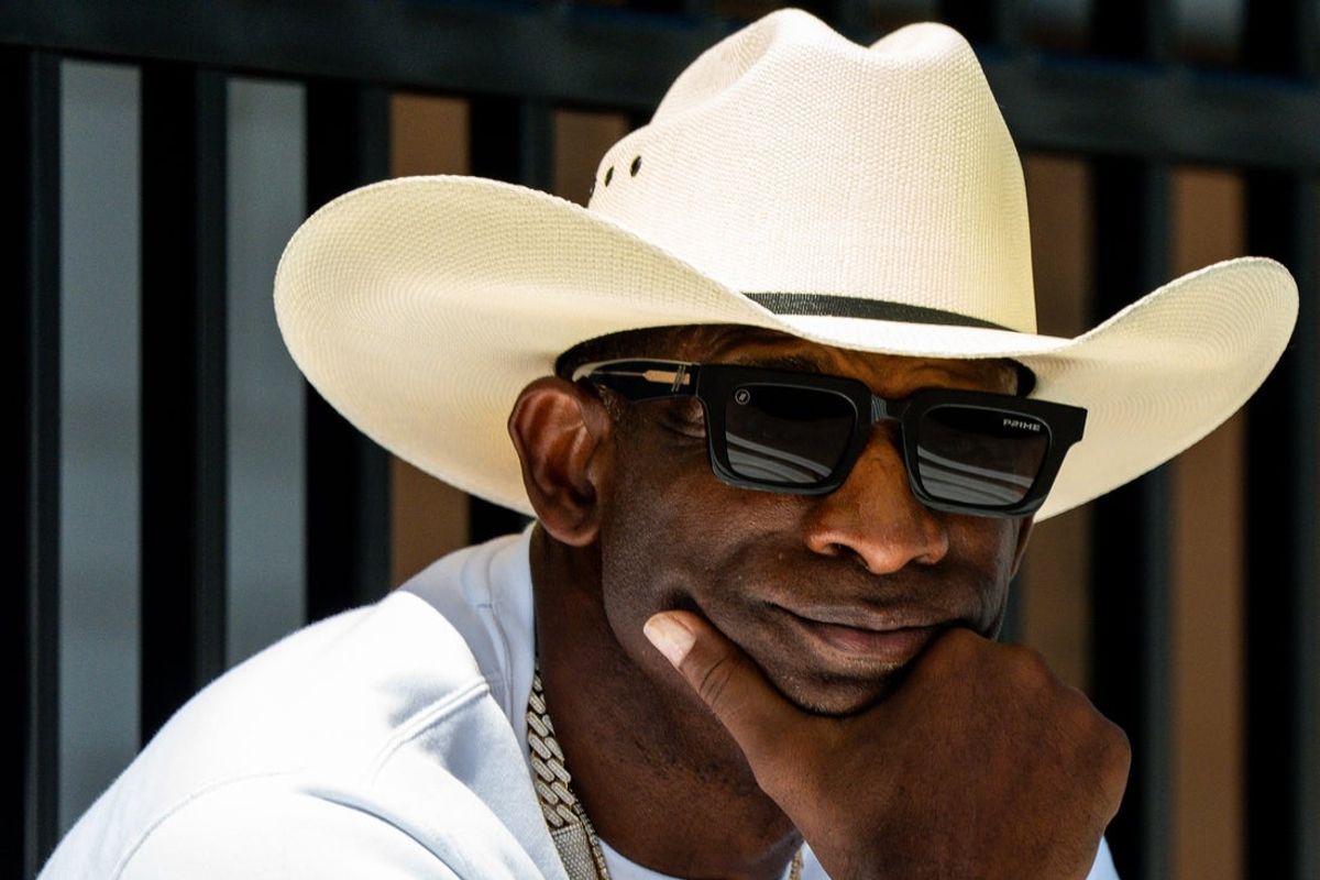 Deion Sanders takes in the second day of Cleveland Browns training camp, July 30, 2026, in Berea, Ohio.