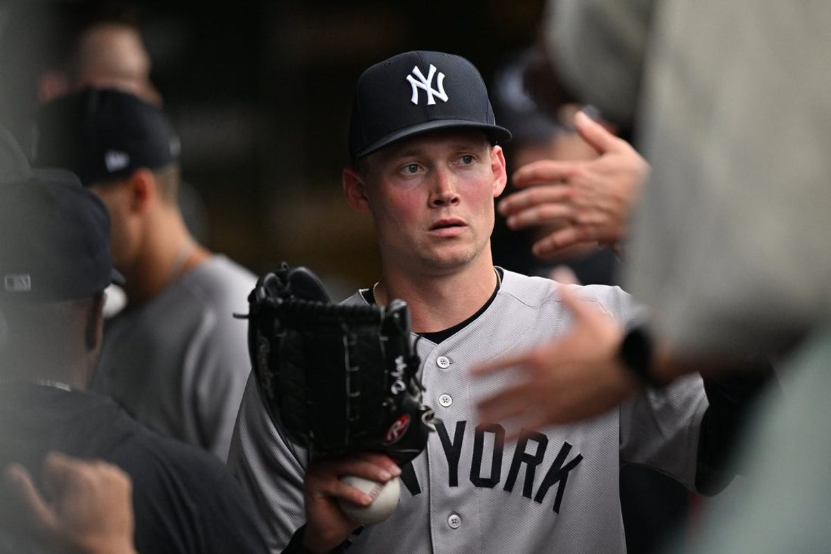 Jul 31, 2026; Chicago, Illinois, USA; New York Yankees pitcher Will Warren (29) is greeted in the dugout after being relieved iin the seventh inning against the Chicago Cubs at Wrigley Field. Mandatory Credit: Patrick Gorski-Imagn Images