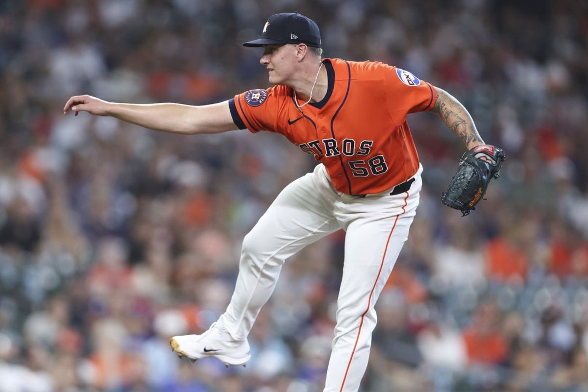 Jul 31, 2026; Houston, Texas, USA; Houston Astros starting pitcher Hunter Brown (58) delivers a pitch during the first inning against the Texas Rangers at Daikin Park. Mandatory Credit: Troy Taormina-Imagn Images