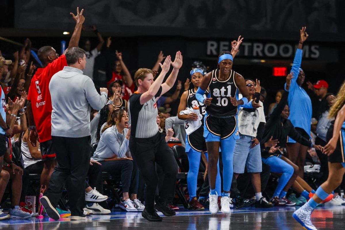 Jul 31, 2026; College Park, Georgia, USA; Atlanta Dream guard Rhyne Howard (10) and the Atlanta Dream bench celebrate a three-point basket against the Seattle Storm during the first quarter at Gateway Center Arena at College Park. Mandatory Credit: Jordan Godfree-Imagn Images