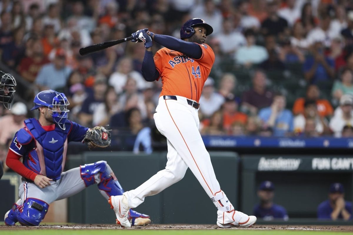 Jul 31, 2026; Houston, Texas, USA; Houston Astros designated hitter Yordan Alvarez (44) hits a single during the first inning against the Texas Rangers at Daikin Park. Mandatory Credit: Troy Taormina-Imagn Images