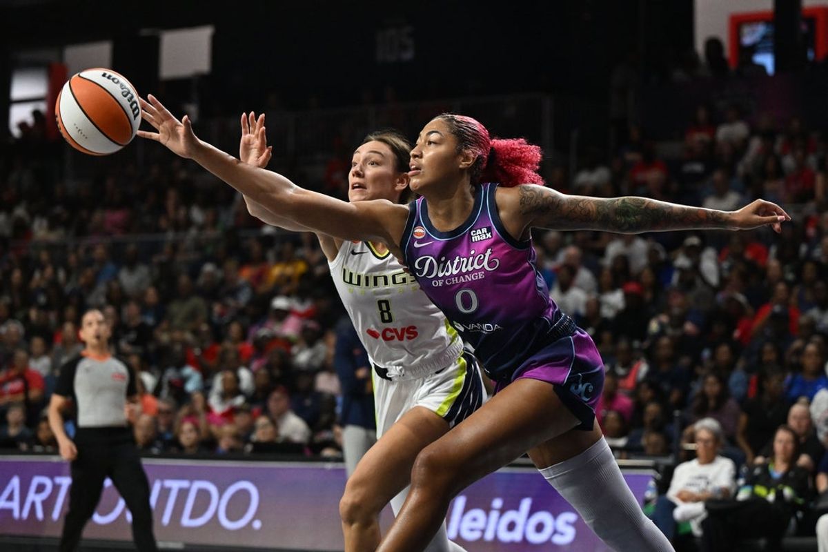 Jul 31, 2026; Washington, District of Columbia, USA; Washington Mystics center Shakira Austin (0) battles Dallas Wings forward Alanna Smith (8) for the ball at CareFirst Arena. Mandatory Credit: Brad Mills-Imagn Images