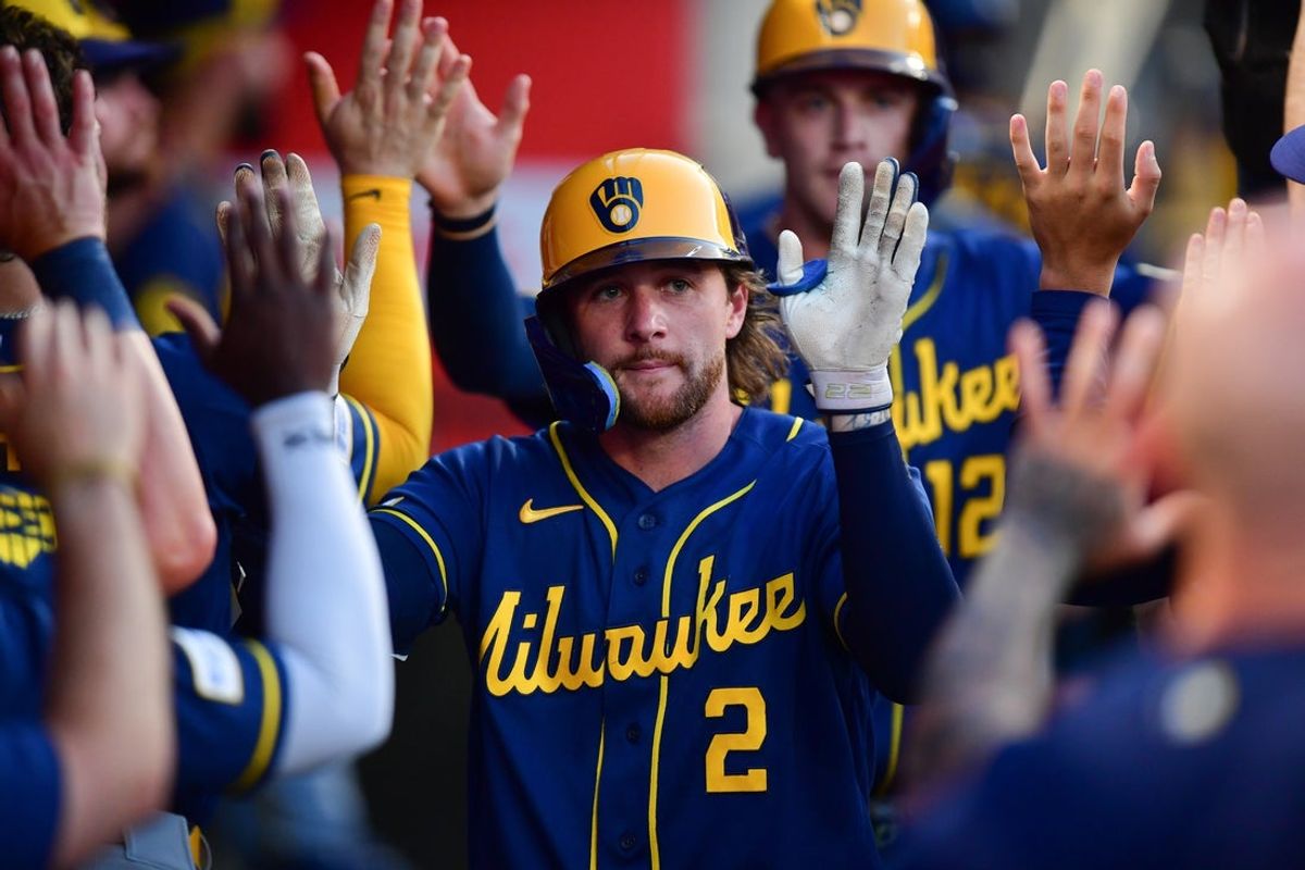 Jul 31, 2026; Anaheim, California, USA; Milwaukee Brewers second baseman Brice Turang (2) is greeted after hitting a two run home run against the Los Angeles Angels during the fifth inning  at Angel Stadium. Mandatory Credit: Gary A. Vasquez-Imagn Images