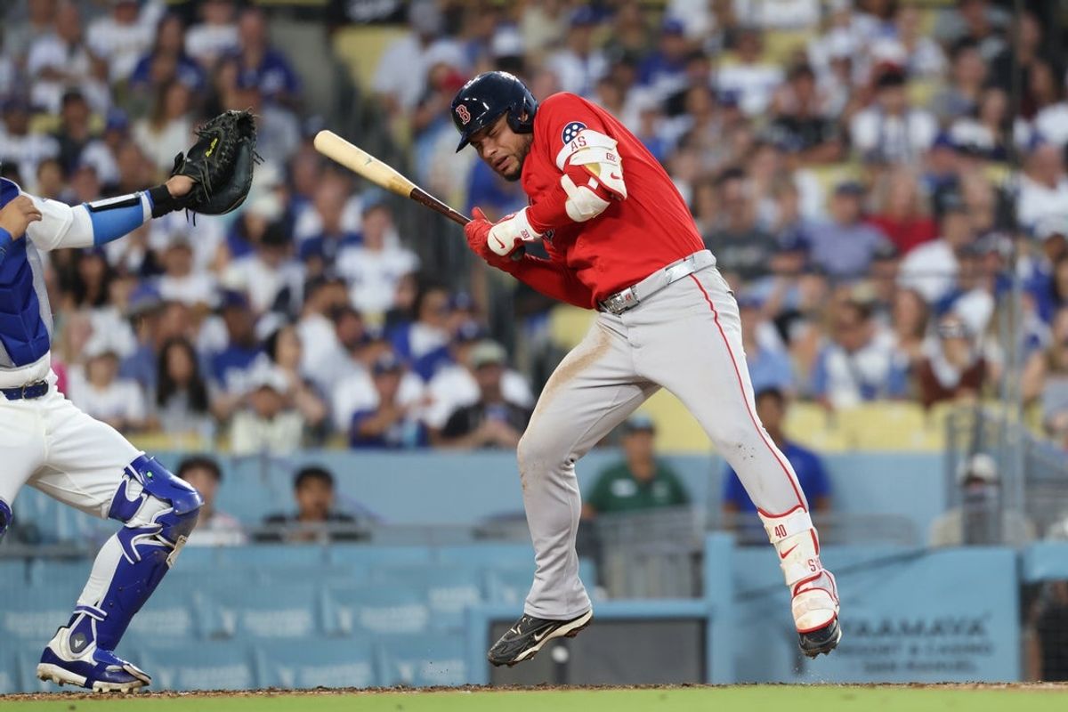 Jul 31, 2026; Los Angeles, California, USA; Boston Red Sox infielder Willson Contreras (40) is hit in the head with a pitch thrown by Los Angeles Dodgers pitcher Cole Irvin (not pictured) during the third inning at Dodger Stadium. Mandatory Credit: Kiyoshi Mio-Imagn Images