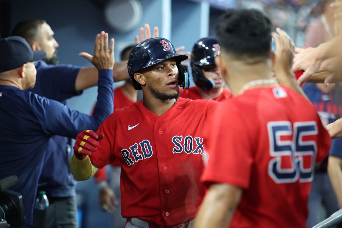 Jul 31, 2026; Los Angeles, California, USA; Boston Red Sox outfielder Ceddanne Rafaela (3) celebrates with teammates in the dugout after scoring a run during the third inning against the Los Angeles Dodgers at Dodger Stadium. Mandatory Credit: Kiyoshi Mio-Imagn Images
