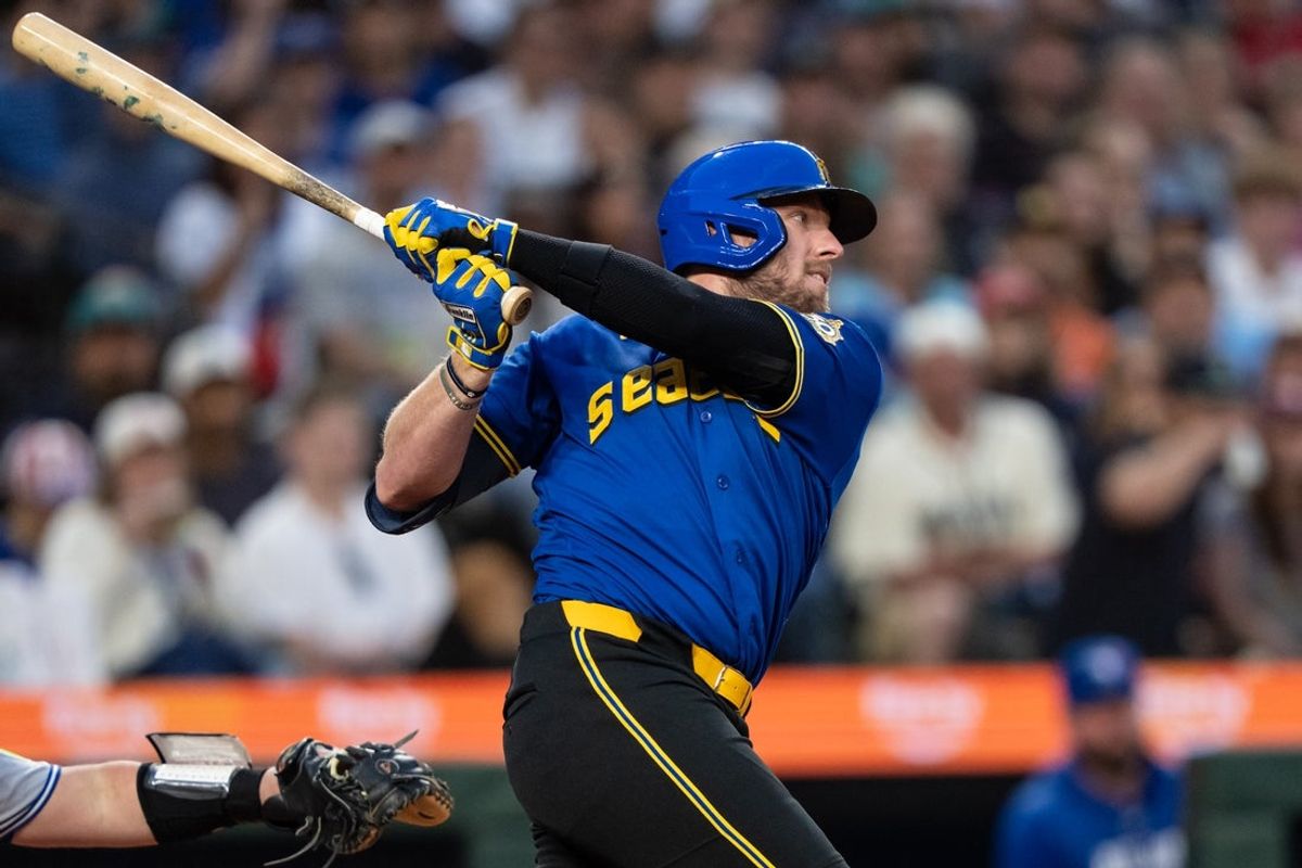 Jul 3, 2026; Seattle, Washington, USA;  Seattle Mariners right fielder Luke Raley (20) takes a swing during an at-bat against the Toronto Blue Jays at T-Mobile Park. Mandatory Credit: Stephen Brashear-Imagn Images