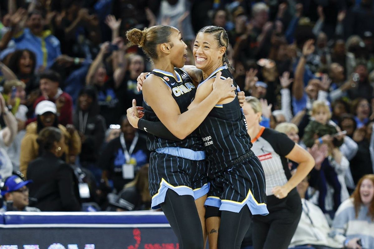 Aug 1, 2026; Chicago, Illinois, USA; Chicago Sky guard Sydney Taylor (12) celebrates with guard Natasha Cloud (9) after scoring a game winning three-pointer against the Las Vegas Aces during the second half of a WNBA game at Wintrust Arena. Mandatory Credit: Kamil Krzaczynski-Imagn Images