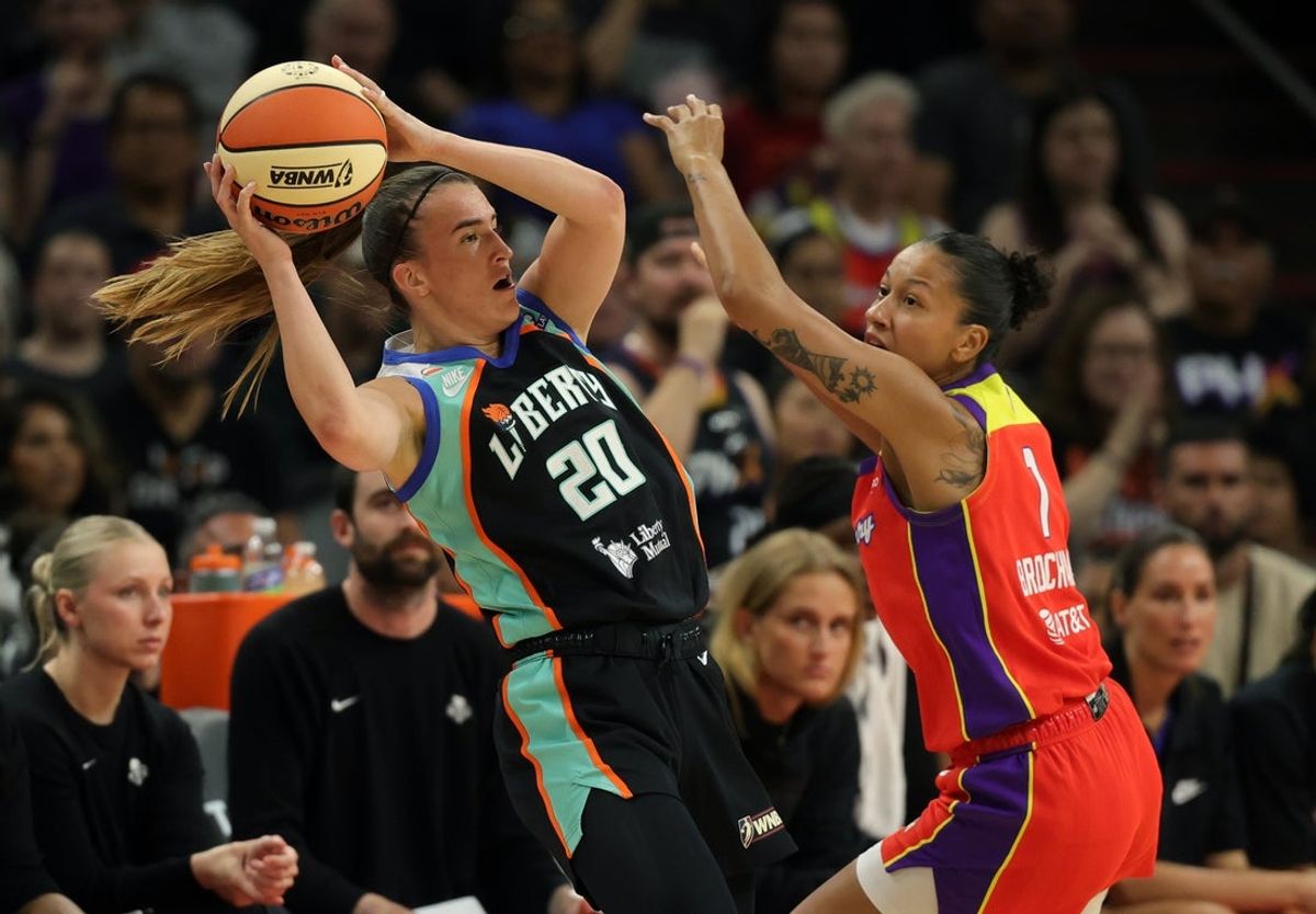 Aug 1, 2026; Phoenix, Arizona, USA; New York Liberty guard Sabrina Ionescu (20) against Phoenix Mercury forward Noemie Brochant (1) in the first half at Mortgage Matchup Center. Mandatory Credit: Mark J. Rebilas-Imagn Images