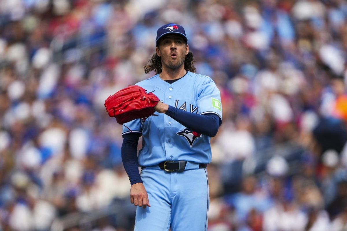 Aug 1, 2026; Toronto, Ontario, CAN;  Toronto Blue Jays pitcher Kevin Gausman (34) celebrates after throwing a strike against the St. Louis Cardinals during the fourth inning at Rogers Centre. Mandatory Credit: Kevin Sousa-Imagn Images