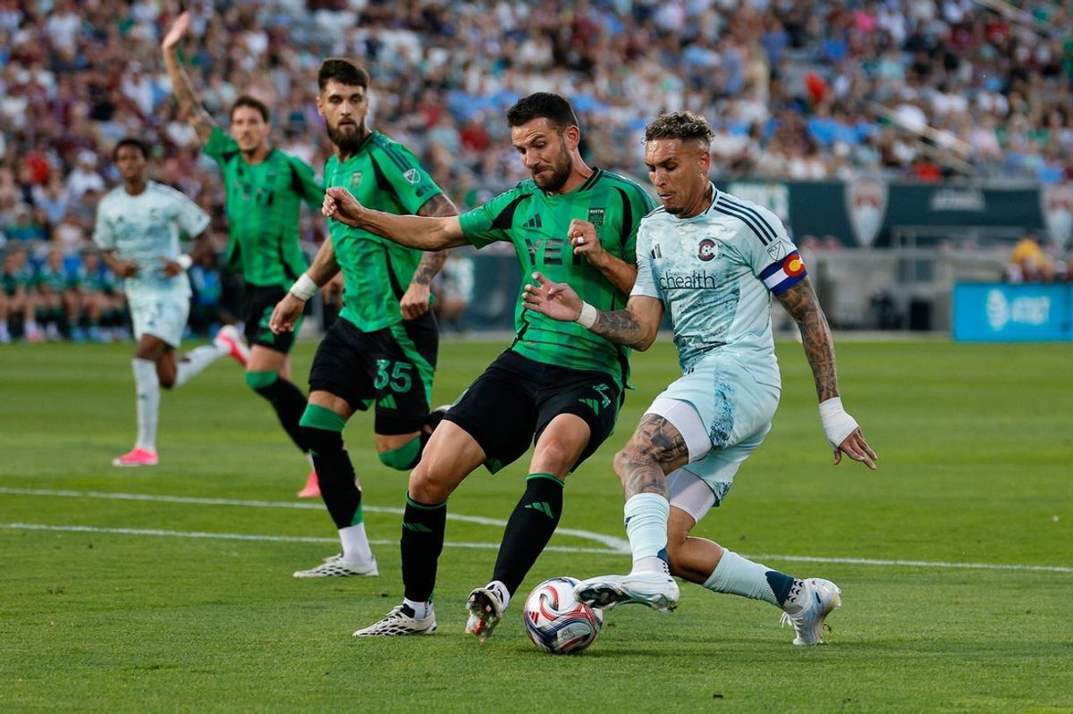 Aug 1, 2026; Commerce City, Colorado, USA; Colorado Rapids forward Rafael Navarro (9) and Austin FC defender Brendan Hines-Ike (4) battle for the ball in the first half at Dick's Sporting Goods Park. Mandatory Credit: Isaiah J. Downing-Imagn Images