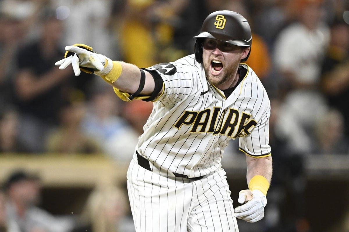 Aug 1, 2026; San Diego, California, USA; San Diego Padres second baseman Jake Cronenworth (9) celebrates after hitting a walk-off single during the ninth inning against the San Francisco Giants at Petco Park. Mandatory Credit: Denis Poroy-Imagn Images