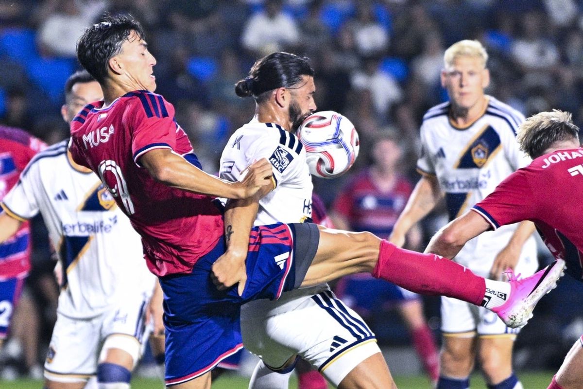 Aug 1, 2026; Carson, California, USA; FC Dallas forward Petar Musa (9) kicks the ball into the face of LA Galaxy midfielder Justin Haak (15) during the first half at Dignity Health Sports Park. Mandatory Credit: Kelvin Kuo-Imagn Images