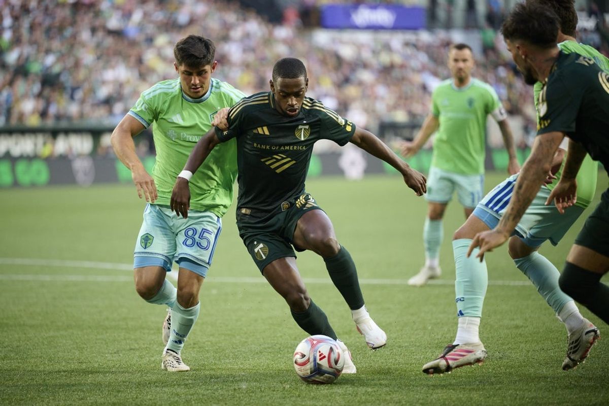 Aug 1, 2026; Portland, Oregon, USA; Portland Timbers midfielder David Da Costa (10) controls the ball during the first half against Seattle Sounders FC defender Kalani Kossa-Rienzi (85) at Providence Park. Mandatory Credit: Troy Wayrynen-Imagn Images