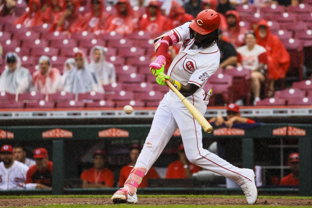 Aug 2, 2026; Cincinnati, Ohio, USA; Cincinnati Reds shortstop Elly de la Cruz (44) hits a two-run single in the third inning against the Pittsburgh Pirates at Great American Ball Park. Mandatory Credit: Katie Stratman-Imagn Images