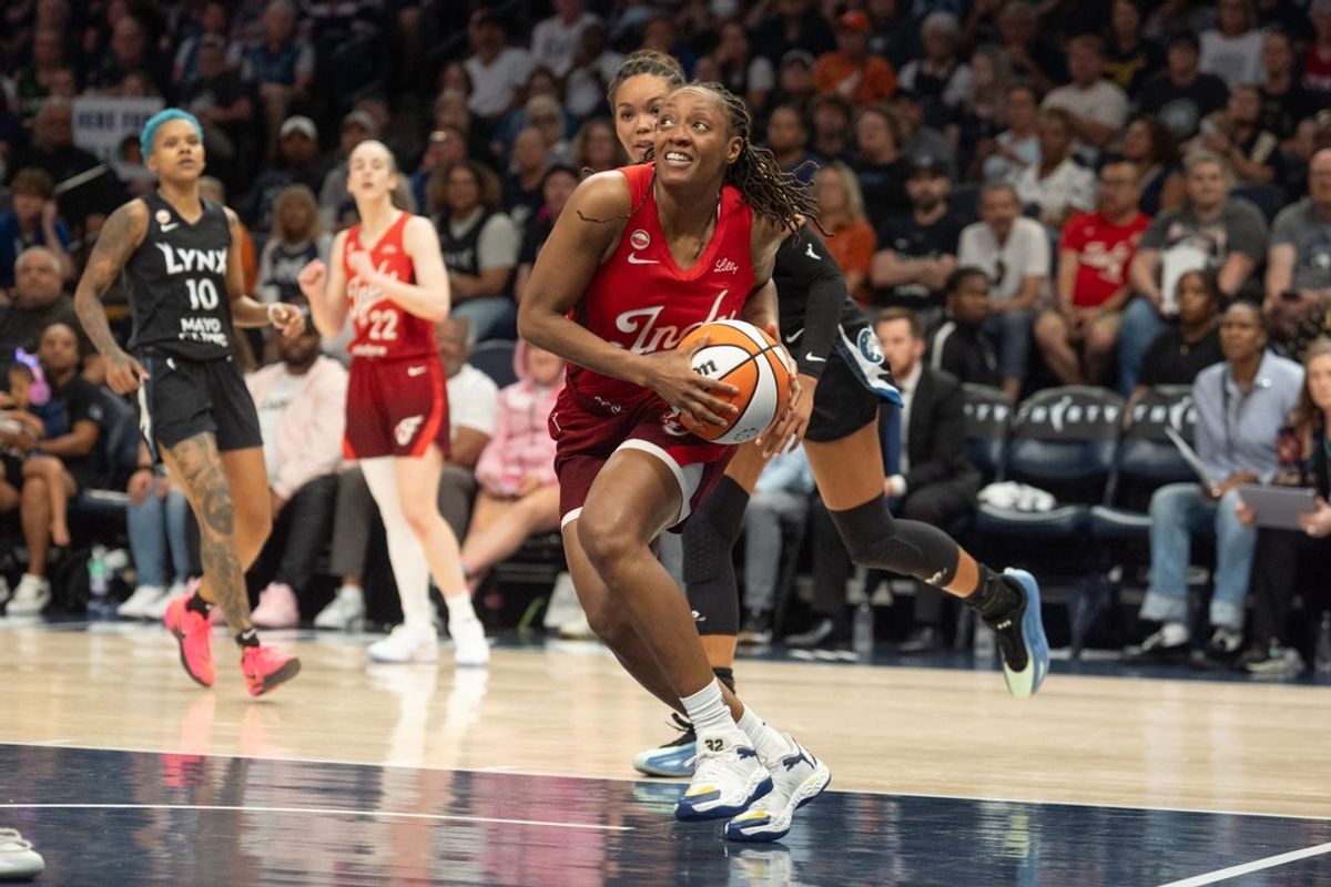 Aug 2, 2026; Minneapolis, Minnesota, USA; Indiana Fever guard Kelsey Mitchell (0) drives to the basket past the defense of Minnesota Lynx forward Napheesa Collier (24) in the fourth quarter at Target Center. Mandatory Credit: Matt Blewett-Imagn Images