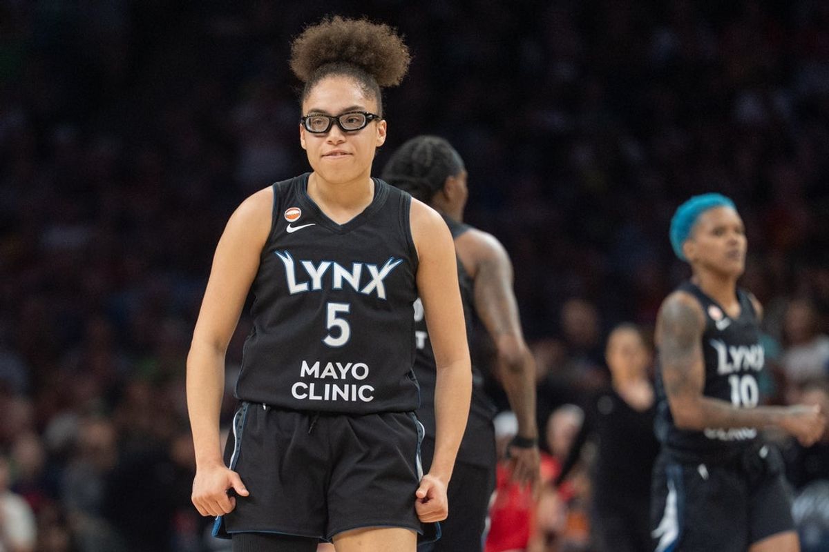 Aug 2, 2026; Minneapolis, Minnesota, USA; Minnesota Lynx guard Olivia Miles (5) reacts to a made basket abasing the Indiana Fever in the second quarter at Target Center. Mandatory Credit: Matt Blewett-Imagn Images