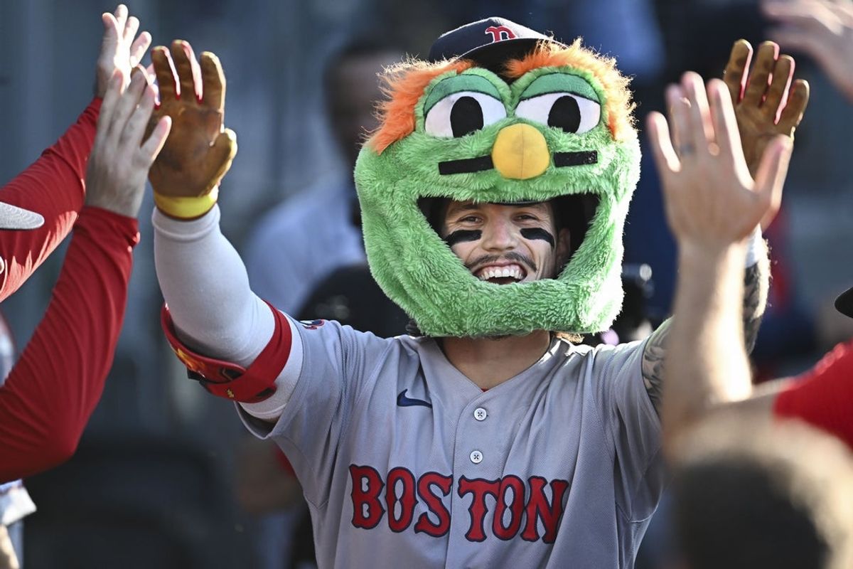 Aug 2, 2026; Los Angeles, California, USA; Boston Red Sox left fielder Jarren Duran (16) celebrates with teammates in the dugout after hitting a solo home run against the Los Angeles Dodgers during the sixth inning at Dodger Stadium. Mandatory Credit: Jonathan Hui-Imagn Images