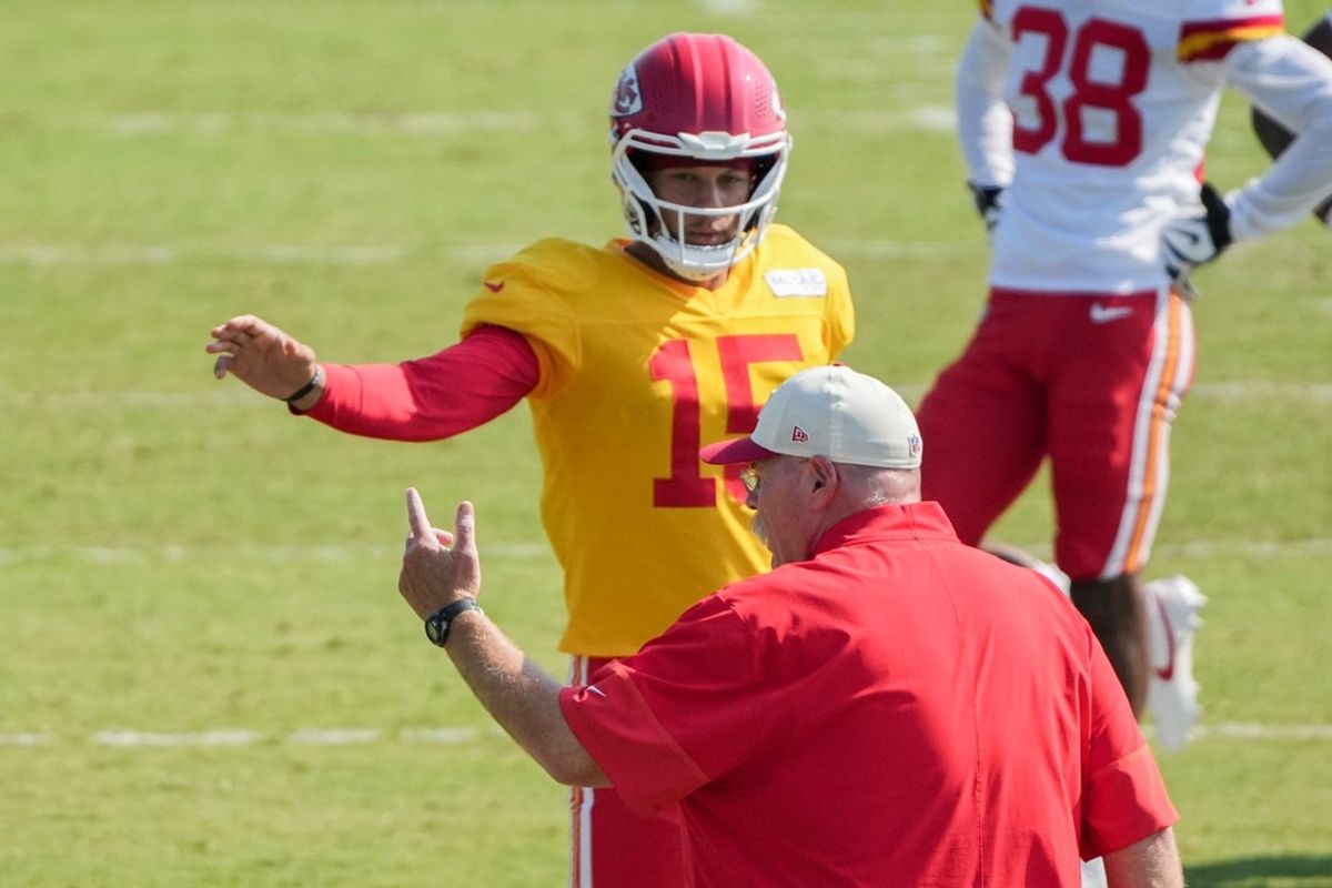 Aug 3, 2026; Kansas City, MO, USA; Kansas City Chiefs   quarterback Patrick Mahomes (15) talks with head coach Andy Reid during training camp at Missouri Western University. Mandatory Credit: Denny Medley-Imagn Images