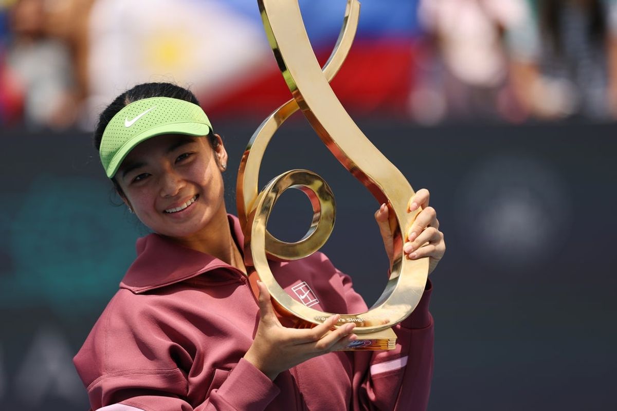 Aug 3, 2026; Washington, D.C., USA; Alexandra Eala (PHI) celebrates with the championship trophy after her match against Jessica Pegula (USA) (not pictured) in the women's singles final of the 2026 Mubadala DC Open at Rock Creek Park Tennis Center. Mandatory Credit: Geoff Burke-Imagn Images