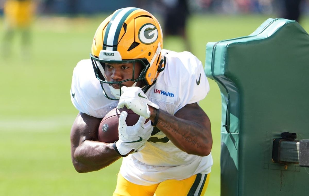 Green Bay Packers running back Josh Jacobs (8) participates in a drill during the fifth day of training camp on Aug. 3, 2026, at Ray Nitschke Field in Ashwaubenon, Wis.
