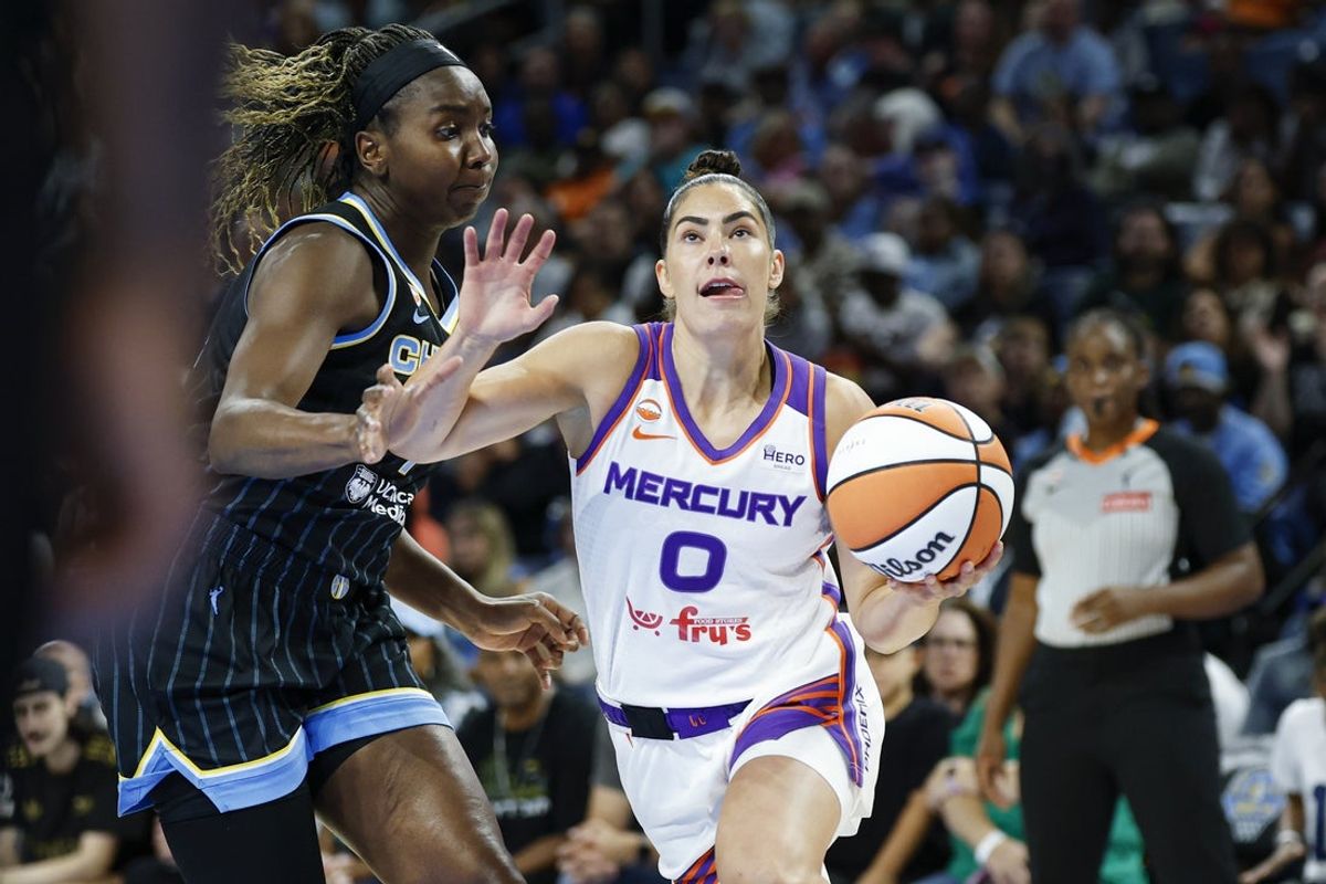 Aug 3, 2026; Chicago, Illinois, USA; Phoenix Mercury guard Kelsey Plum (0) goes to the basket against Chicago Sky center Elizabeth Williams (1) during the first half of a WNBA game at Wintrust Arena. Mandatory Credit: Kamil Krzaczynski-Imagn Images