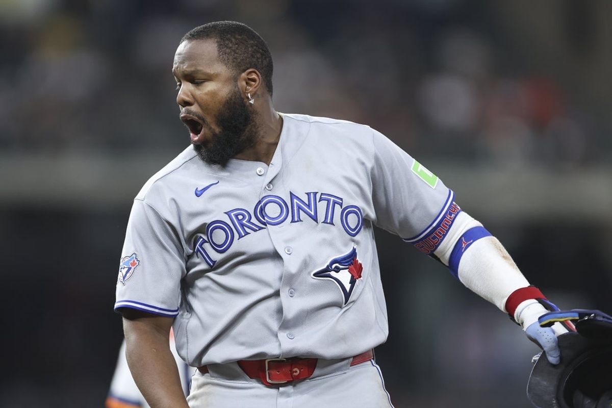 Aug 3, 2026; Houston, Texas, USA; Toronto Blue Jays first baseman Vladimir Guerrero Jr. (27) reacts after a play during the fifth inning against the Houston Astros at Daikin Park. Mandatory Credit: Troy Taormina-Imagn Images