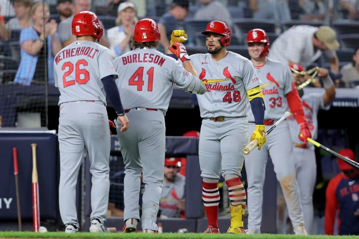 Aug 3, 2026; Bronx, New York, USA; St. Louis Cardinals first baseman Alec Burleson (41) celebrates his two run home run, his third two run home run of the game, with second baseman JJ Wetherholt (26) and on deck batter Ivan Herrera (48) during the eighth inning against the New York Yankees at Yankee Stadium. Mandatory Credit: Brad Penner-Imagn Images