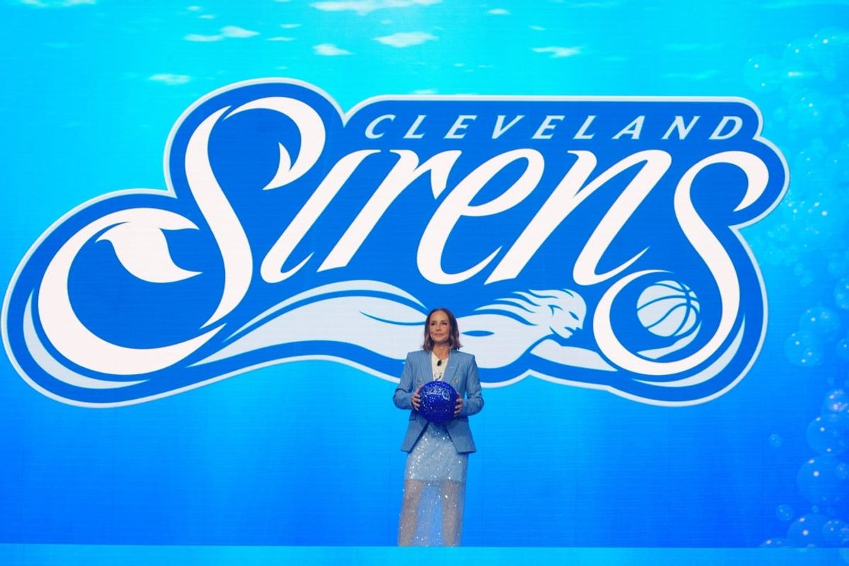 Allison Howard, president of the Cleveland Sirens, takes the stage at the event to debut the name of the 2028 WNBA expansion team at Rocket Arena  in Cleveland, Ohio on Aug. 4, 2026.