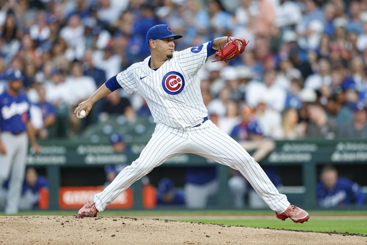 Aug 4, 2026; Chicago, Illinois, USA; Chicago Cubs starting pitcher Javier Assad (72) delivers a pitch against the Los Angeles Dodgers during the second inning at Wrigley Field. Mandatory Credit: Kamil Krzaczynski-Imagn Images