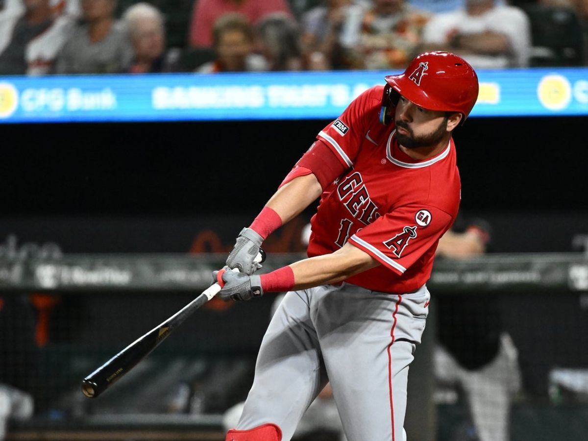 Aug 4, 2026; Baltimore, Maryland, USA; Los Angeles Angels first baseman Nolan Schanuel (18) doubles during the eighth inning against the Baltimore Orioles at Oriole Park at Camden Yards. Mandatory Credit: James A. Pittman-Imagn Images