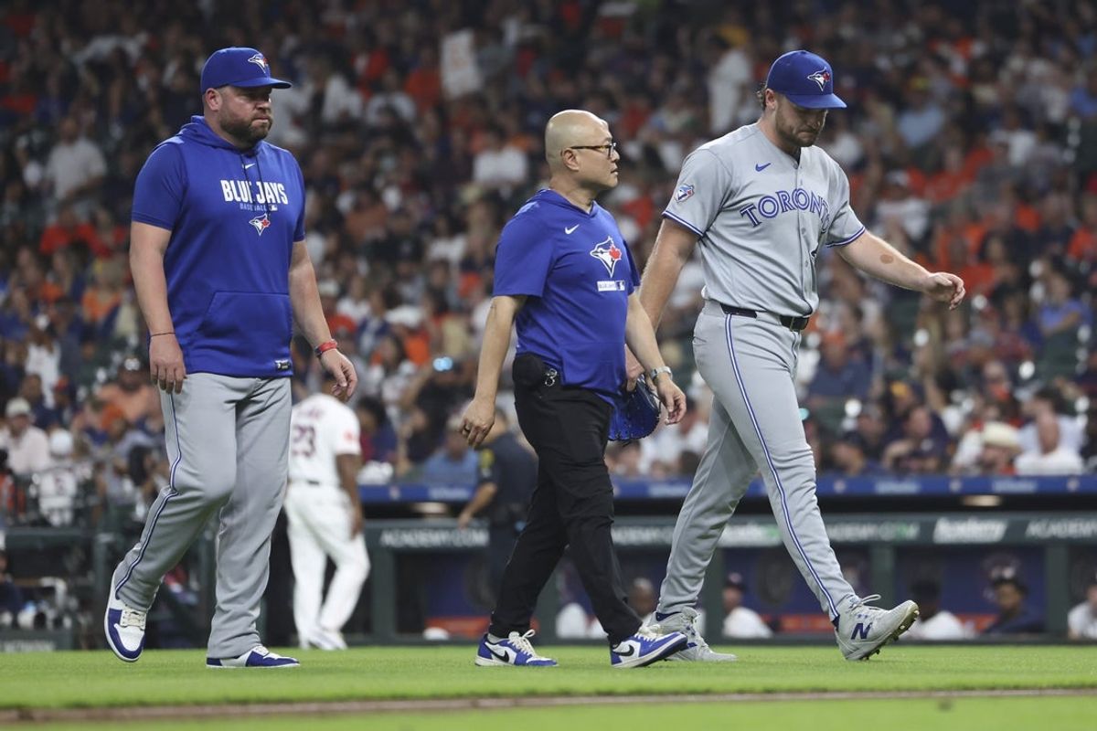 Aug 4, 2026; Houston, Texas, USA; Toronto Blue Jays starting pitcher Trey Yesavage (39) walks off the field after an apparent injury during the third inning against the Houston Astros at Daikin Park. Mandatory Credit: Troy Taormina-Imagn Images
